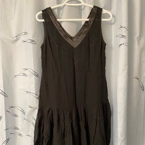 Black V shaped tank dresses
